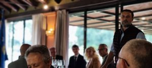 El arqueólogo Alejandro Jiménez expone los nuevos descubrimientos de Itálica en el Rotary Club Sevilla International con la visita de rotarios del club de Leverkusen