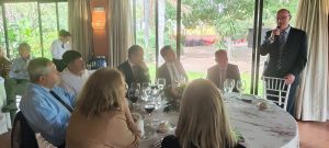 Presentations by Cristian Nila on Effective Communication and by the detective Juan Carlos Arias at the Rotary Club Sevilla International meeting