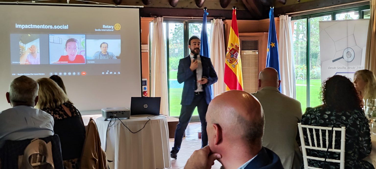 Presentations by Cristian Nila on Effective Communication and by the detective Juan Carlos Arias at the Rotary Club Sevilla International meeting