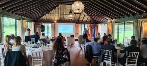 Presentations by Cristian Nila on Effective Communication and by the detective Juan Carlos Arias at the Rotary Club Sevilla International meeting